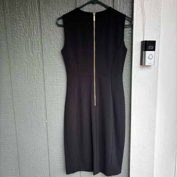 Calvin Klein Black Bodycon Dress | Size 4 | Sleek, Sculpted, Gold Zip Detail - Picture 6 of 10